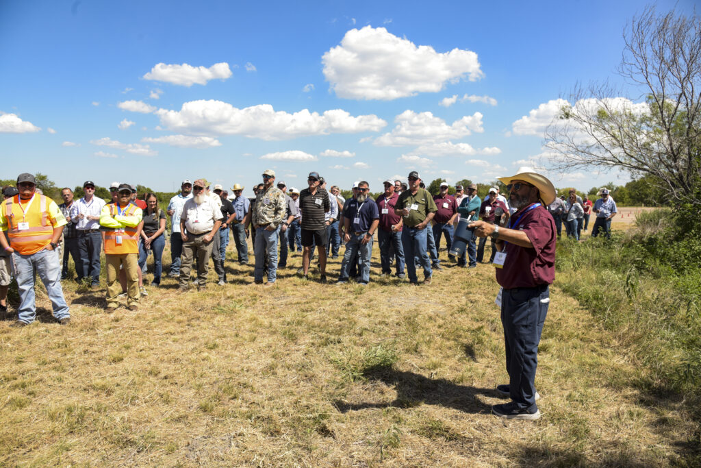 Outdoor discussion during the Texas Vegetation Managers Association Conference.